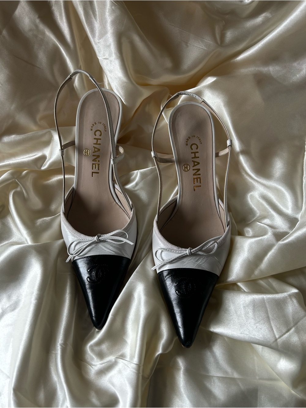 CHANEL Two-Tone Pointed Slingback Mules in White & Black